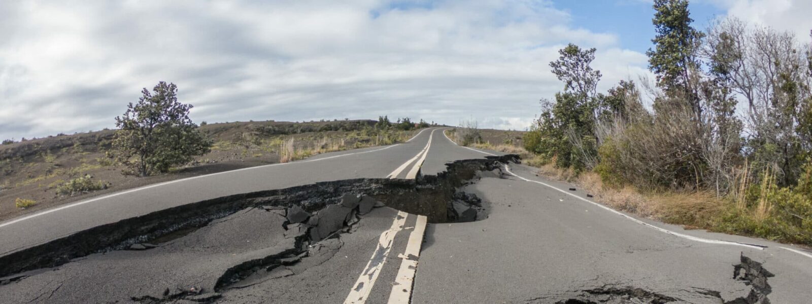 Cracked road from volcano activity in Volcano national park, Hawaii