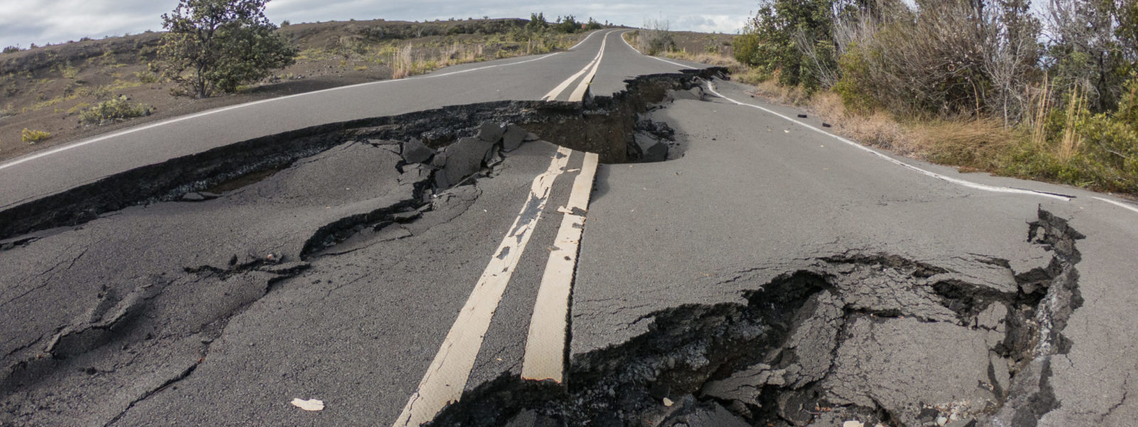Cracked road from volcano activity in Volcano national park, Hawaii