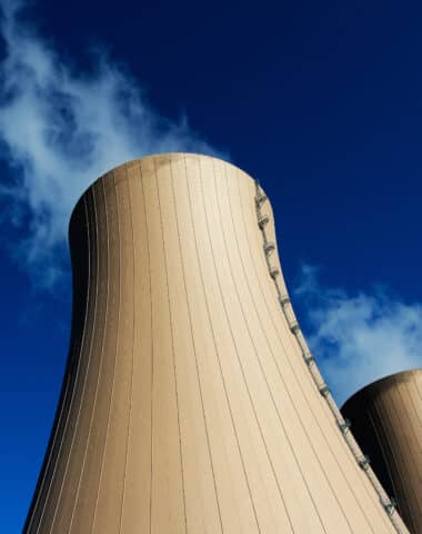 Cooling towers of nuclear power plant against  blue sky