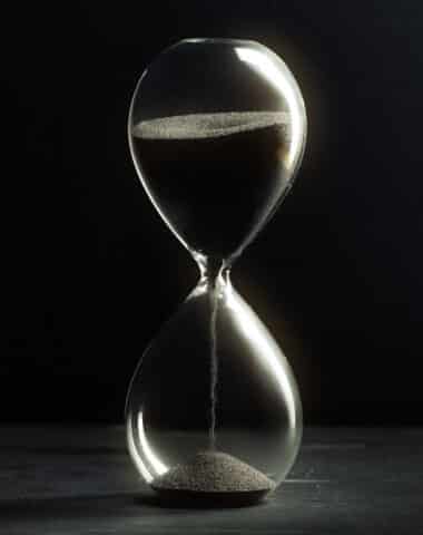 Hourglass on dark background