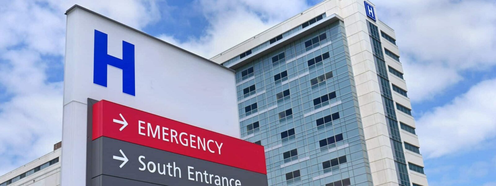 direction sign with capital letter H for hospital