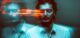 blurred portrait of a man with schizophrenic and mental disorders on a dark background. Stress and paranoia
