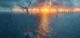 Aerial View of Floating Wind Turbines at Sunset